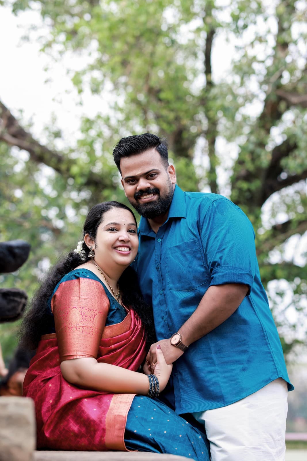 Anjitha and Ajith outdoors